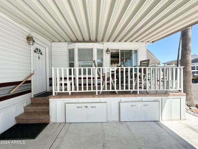 a view of a house with staircase and wooden floor