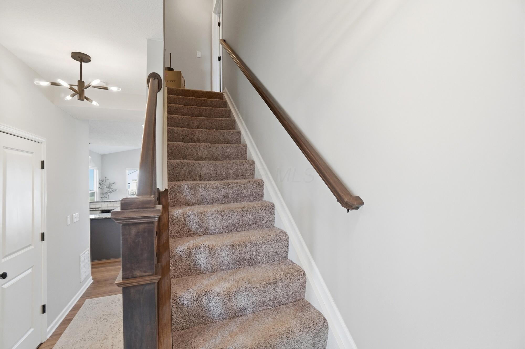 547 Pagoda Loop Delaware, OH 43015 - Photo 20 of 42 Staircase to 2nd floor