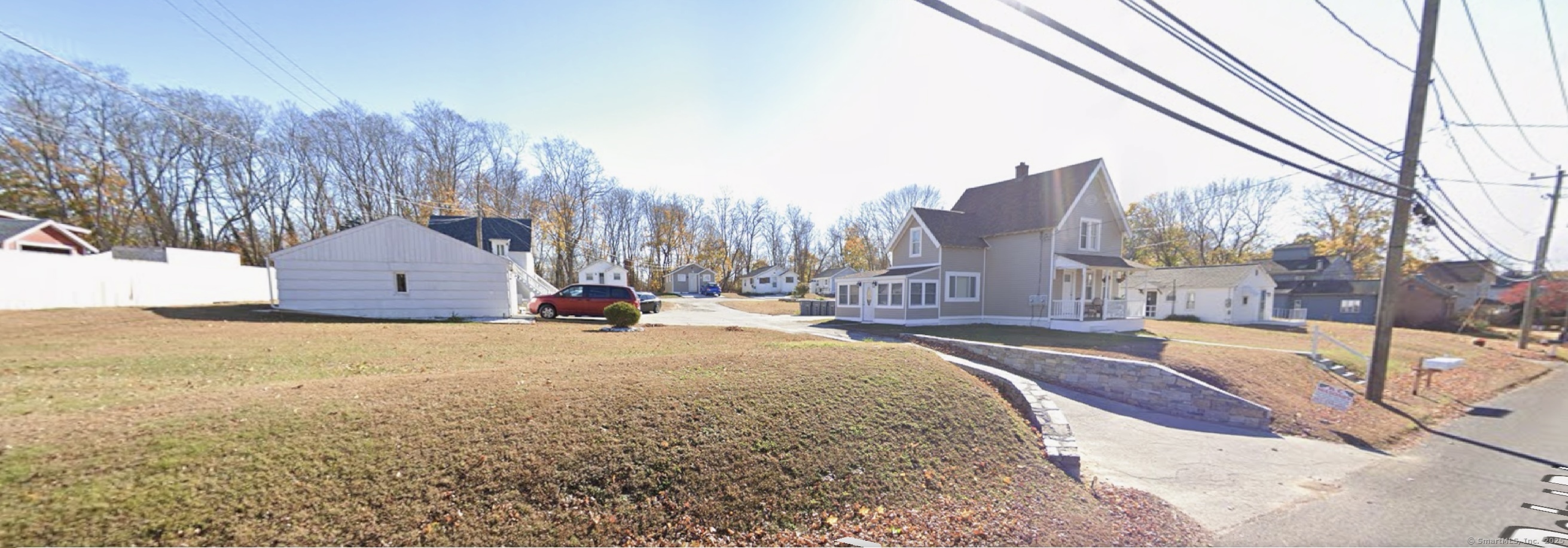 a view of a house with a snow in the yard