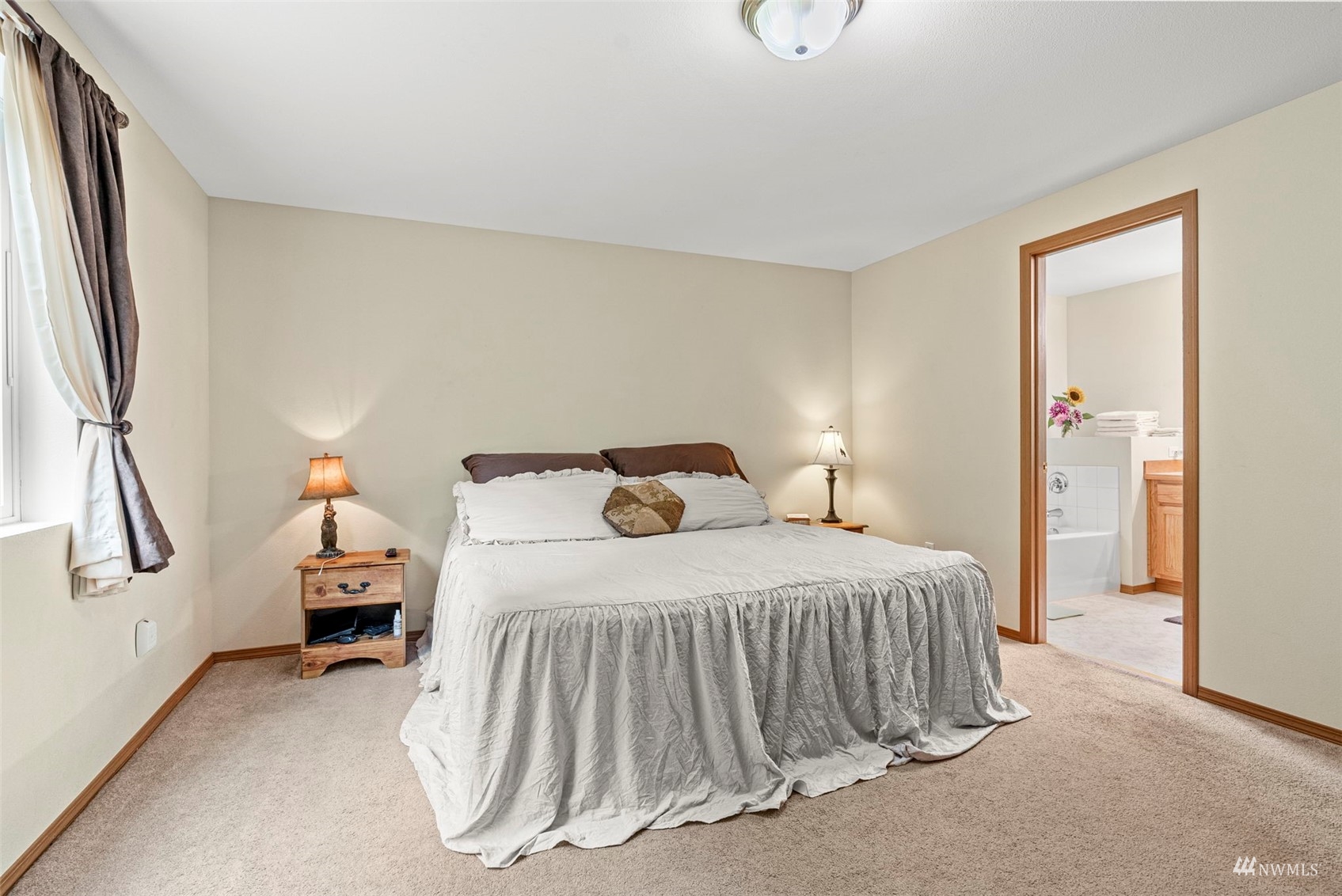 658 Smokey Valley Road Toledo, WA 98591 - Photo 20 of 40 a bedroom with a bed and window
