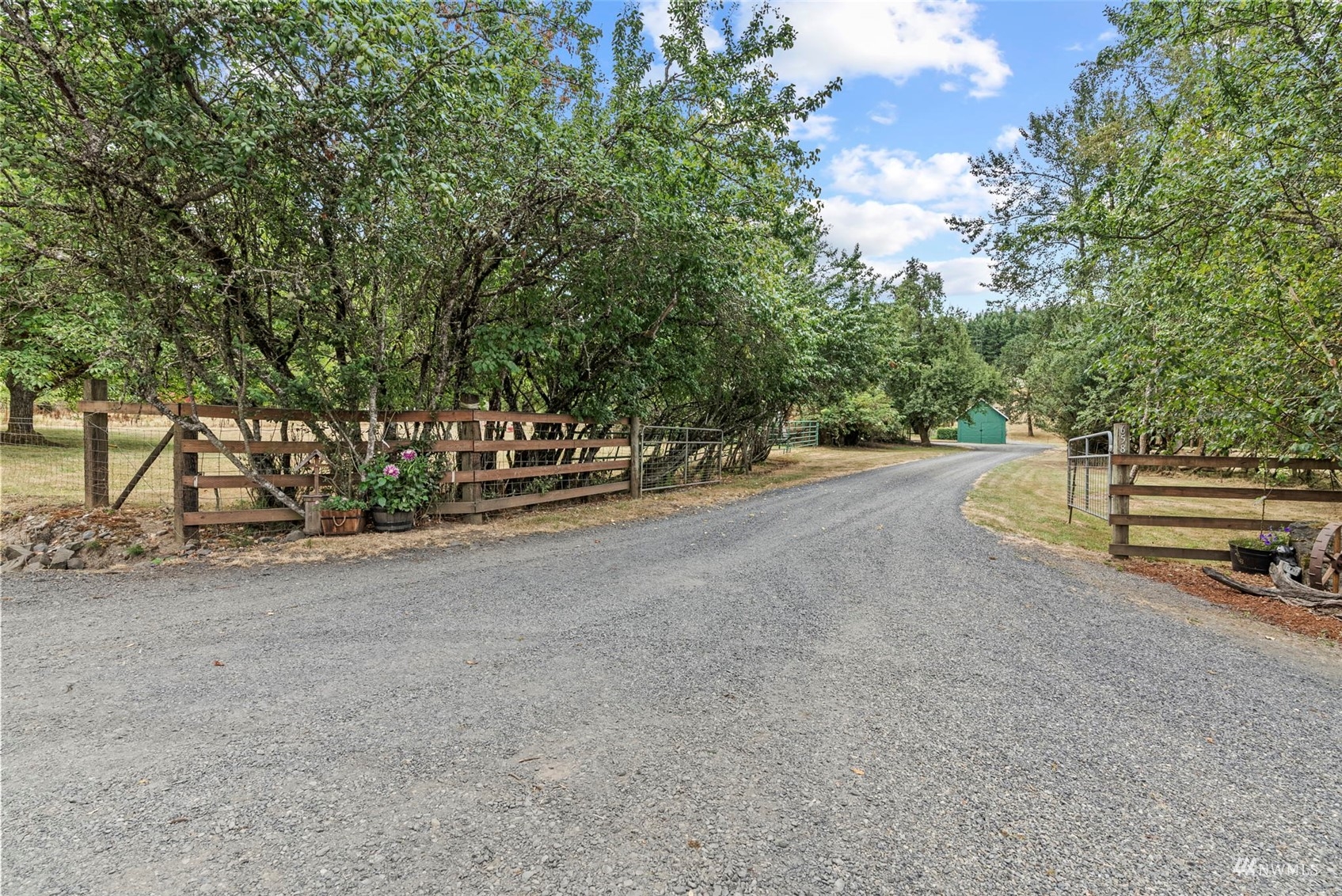 658 Smokey Valley Road Toledo, WA 98591 - Photo 2 of 40 a view of a road with a yard