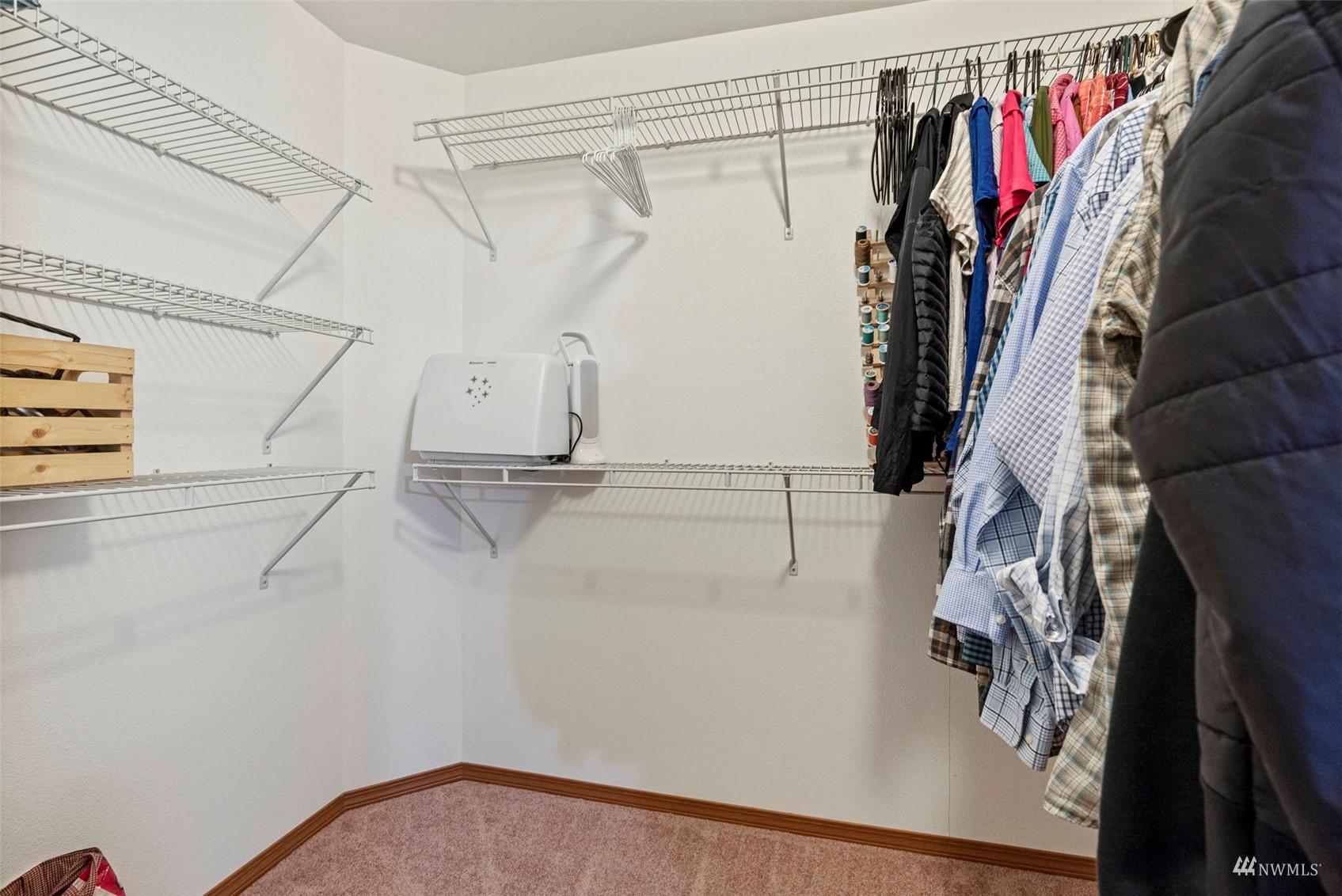 658 Smokey Valley Road Toledo, WA 98591 - Photo 21 of 40 a view of walk in closet with clothes and shoes