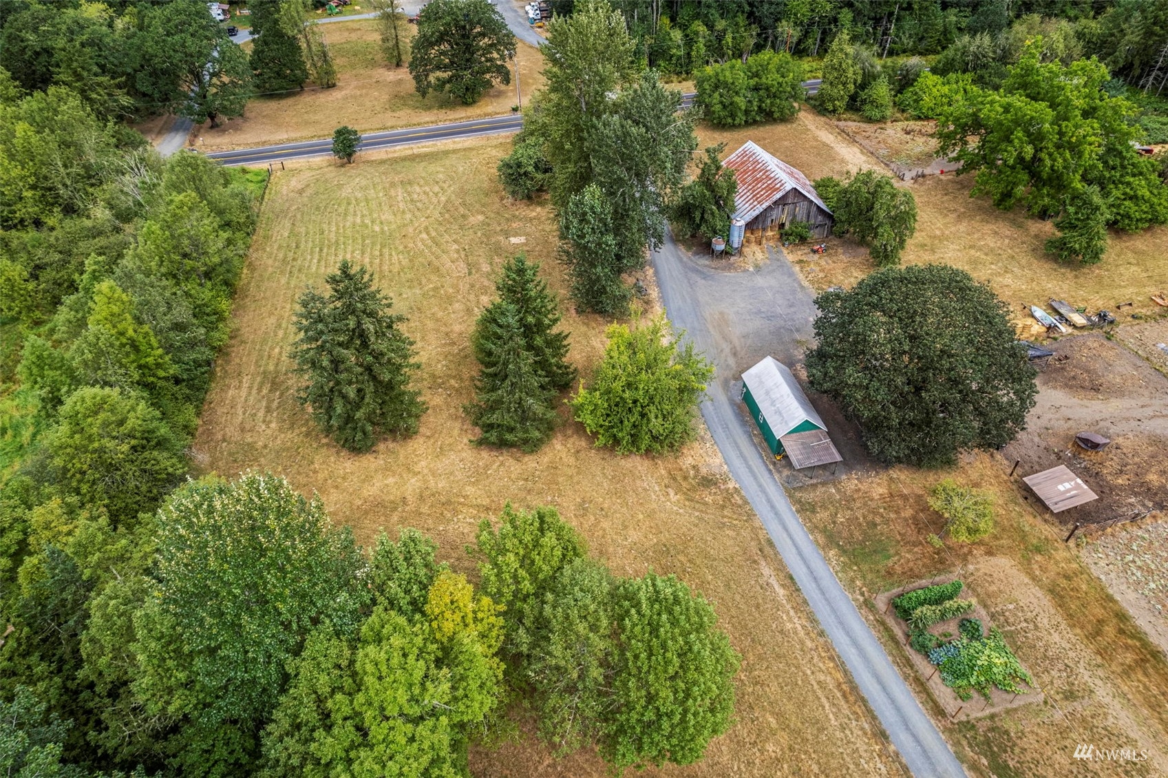 658 Smokey Valley Road Toledo, WA 98591 - Photo 38 of 40 an aerial view of a house with a yard basket ball court and outdoor seating