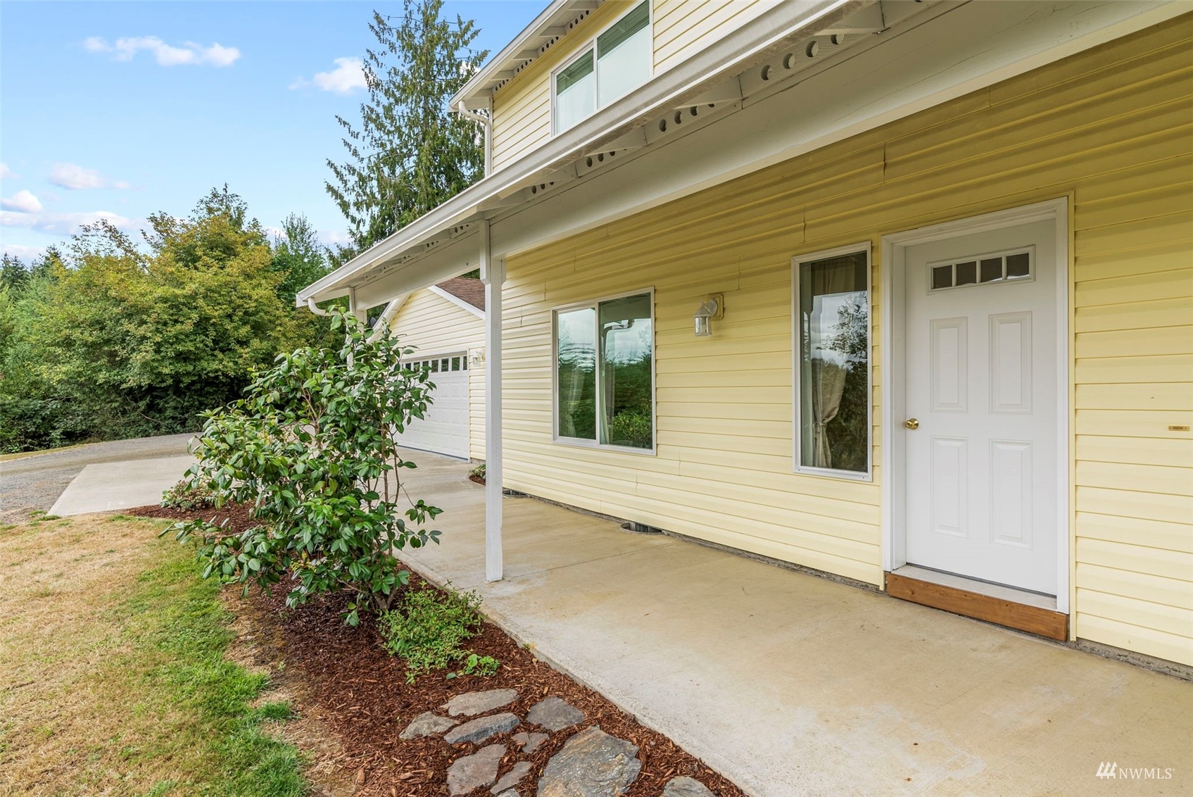 658 Smokey Valley Road Toledo, WA 98591 - Photo 8 of 40 a front view of a house with garden