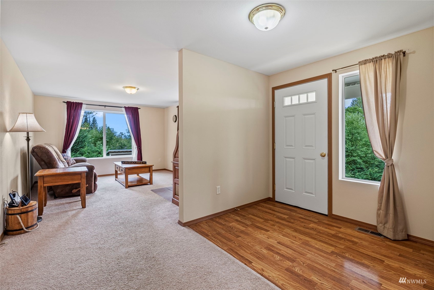 658 Smokey Valley Road Toledo, WA 98591 - Photo 9 of 40 a view of a livingroom with furniture and a window