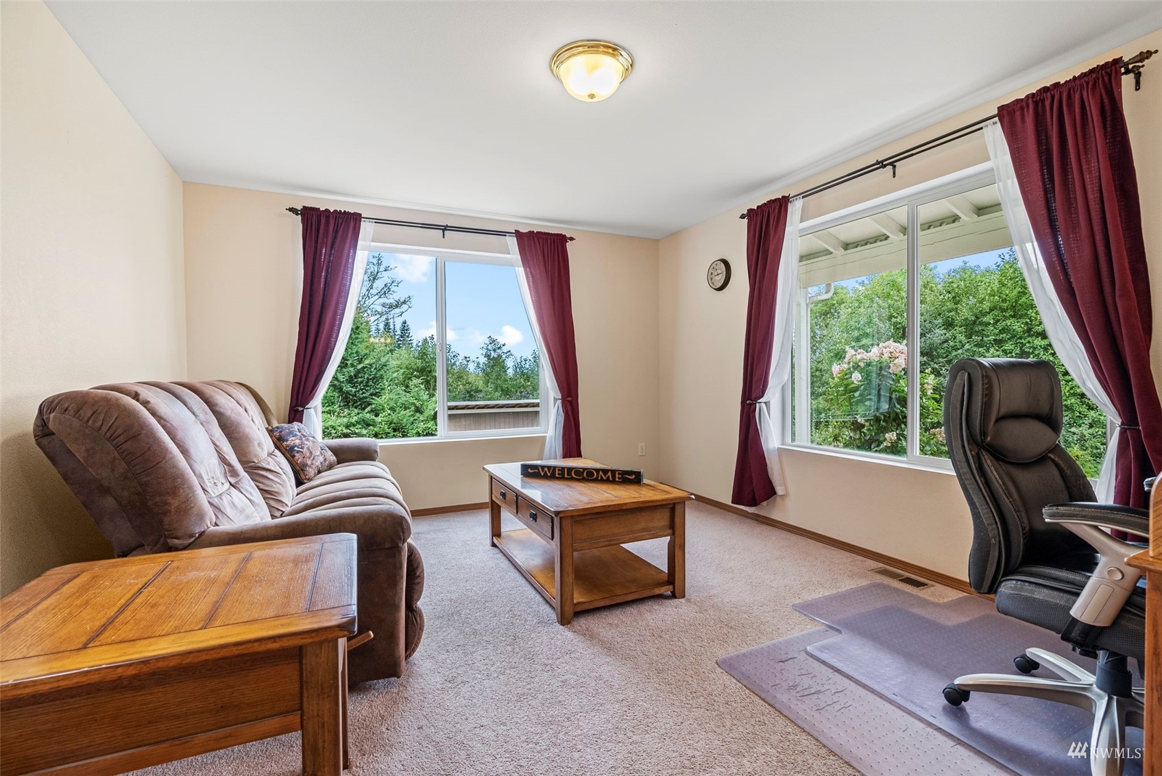 658 Smokey Valley Road Toledo, WA 98591 - Photo 10 of 40 a living room with furniture and a window
