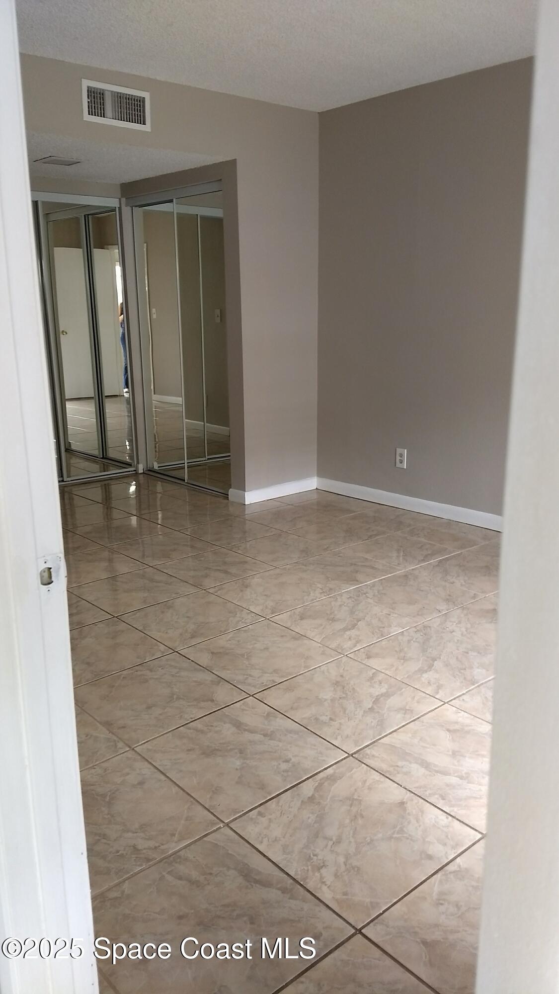 1609 Sunny Brook Lane, Unit E 104 Palm Bay, FL 32905 - Photo 19 of 31 a view of an empty room