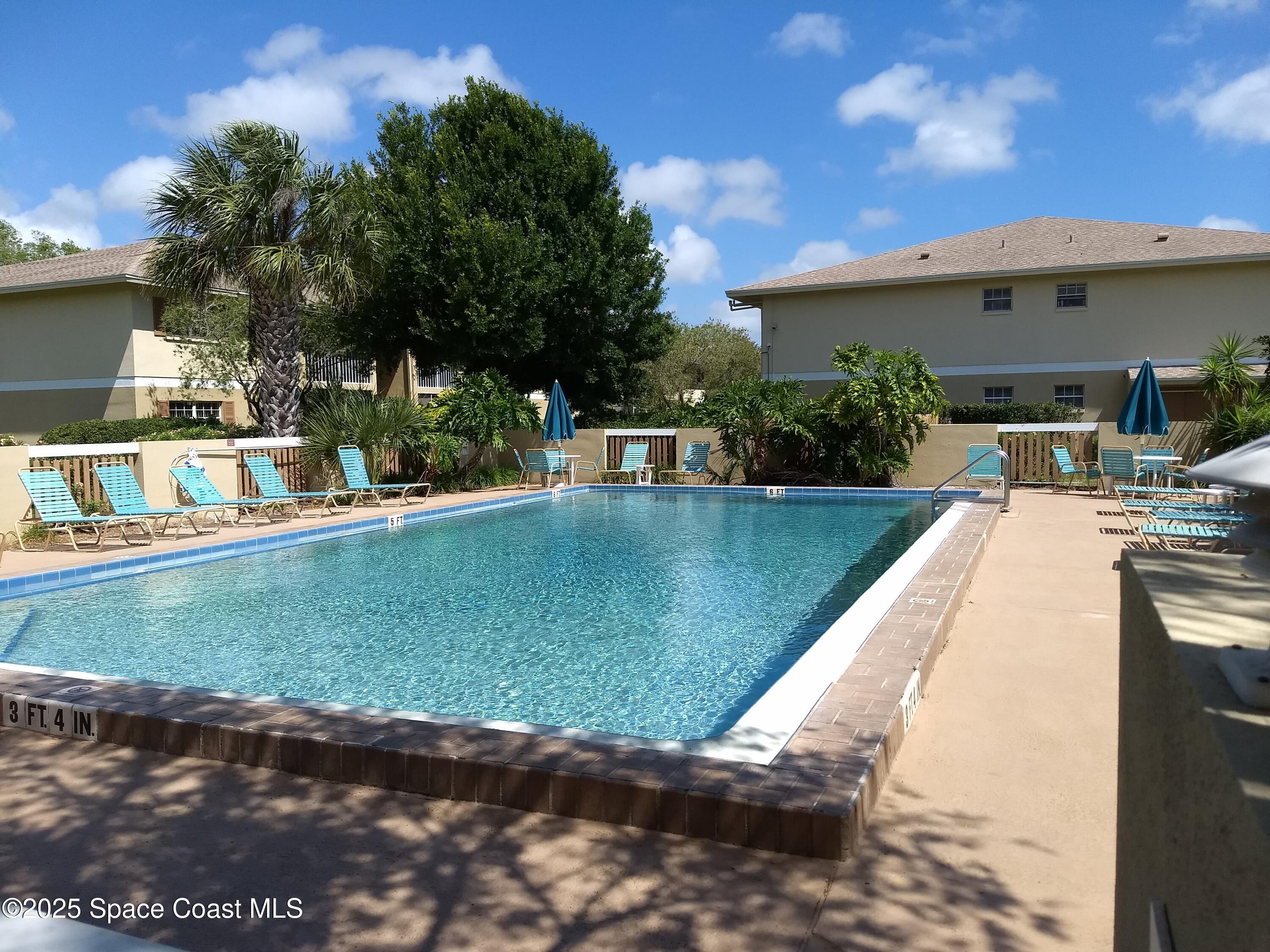 1609 Sunny Brook Lane, Unit E 104 Palm Bay, FL 32905 - Photo 31 of 31 a view of swimming pool with a patio
