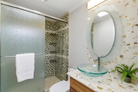 a bathroom with a sink and a mirror