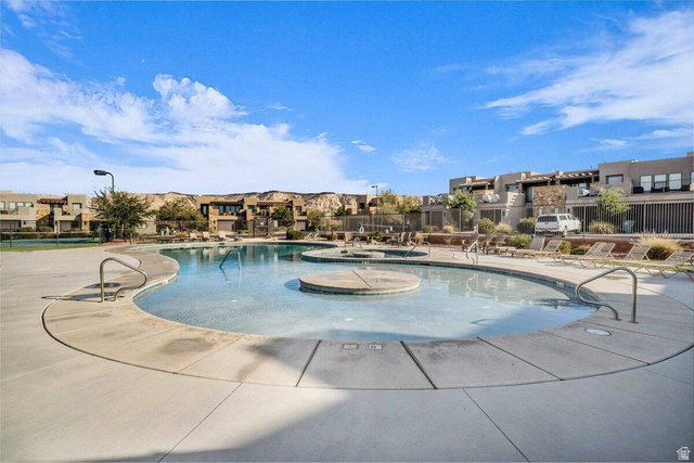 5010 Escapes Drive St. George, UT 84770 - Photo 43 of 46 Community pool featuring a residential view, a patio, and a community hot tub