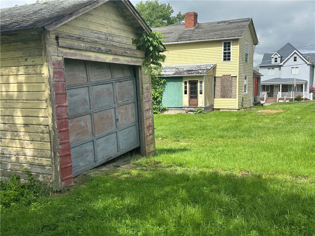 112 Laughlin Street Dawson, PA 15428 - Photo 15 of 15 front view of a house with a yard