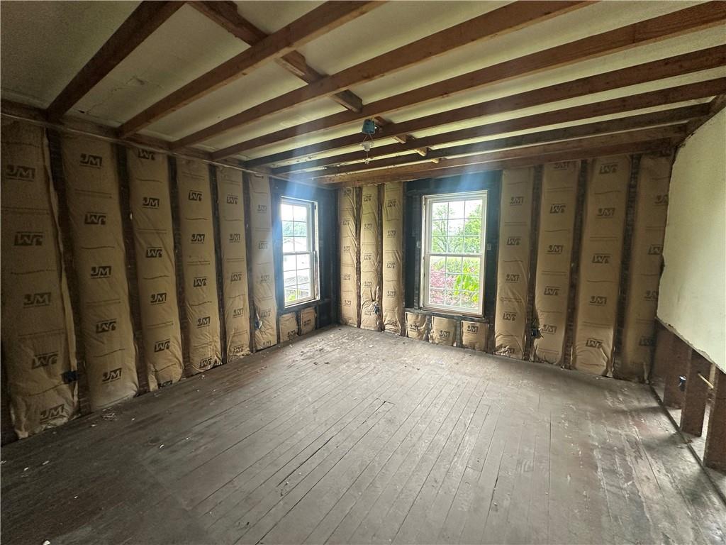112 Laughlin Street Dawson, PA 15428 - Photo 10 of 15 a view of an empty room with a fireplace