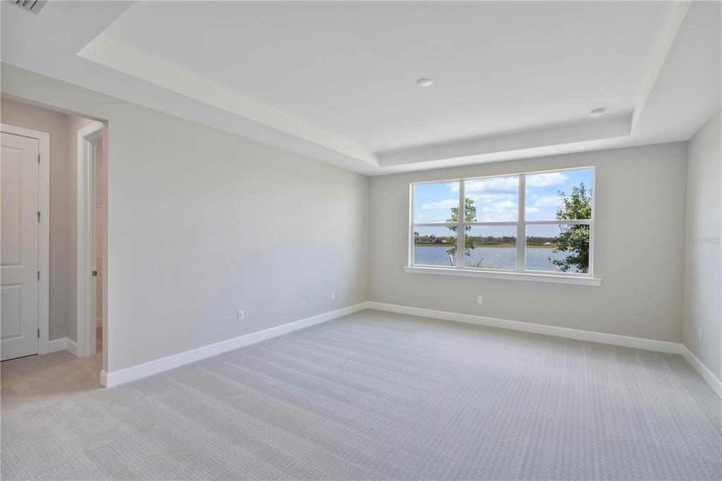 16056 Shoreline Drive Punta Gorda, FL 33982 - Photo 20 of 57 an empty room with windows
