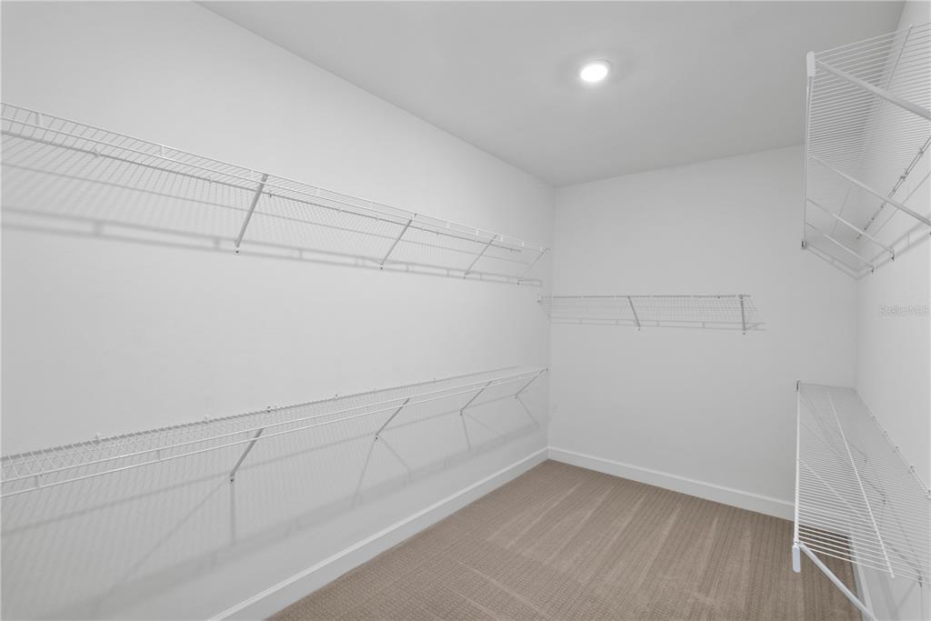 16056 Shoreline Drive Punta Gorda, FL 33982 - Photo 21 of 57 a view of a room with racks on the wall