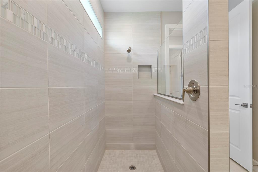 16056 Shoreline Drive Punta Gorda, FL 33982 - Photo 24 of 57 a bathroom with a shower