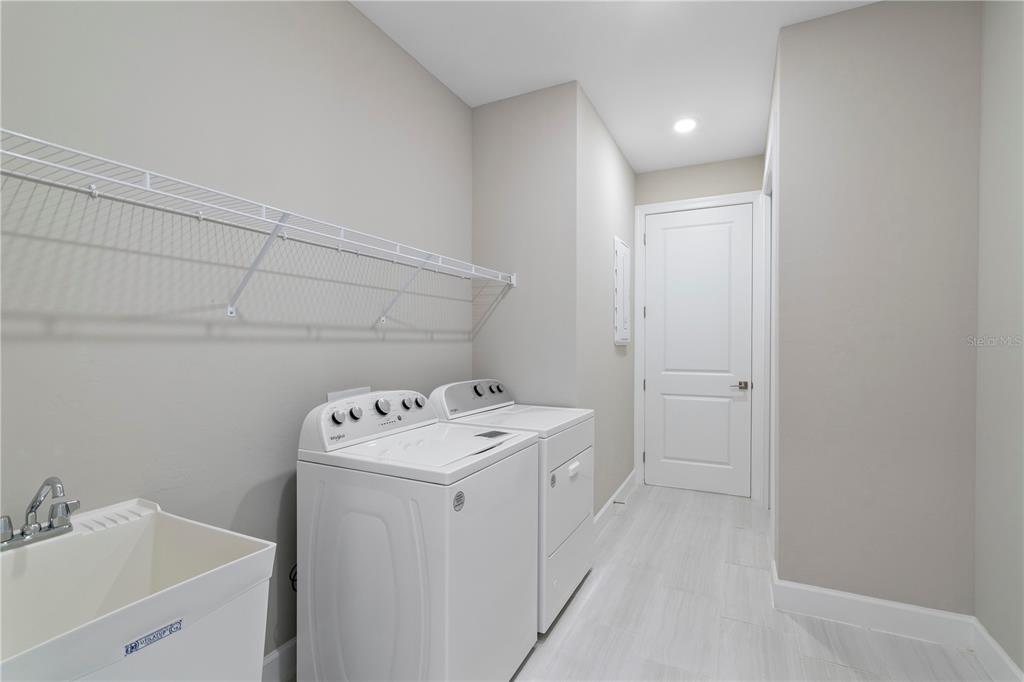 16056 Shoreline Drive Punta Gorda, FL 33982 - Photo 28 of 57 a utility room with dryer and washer