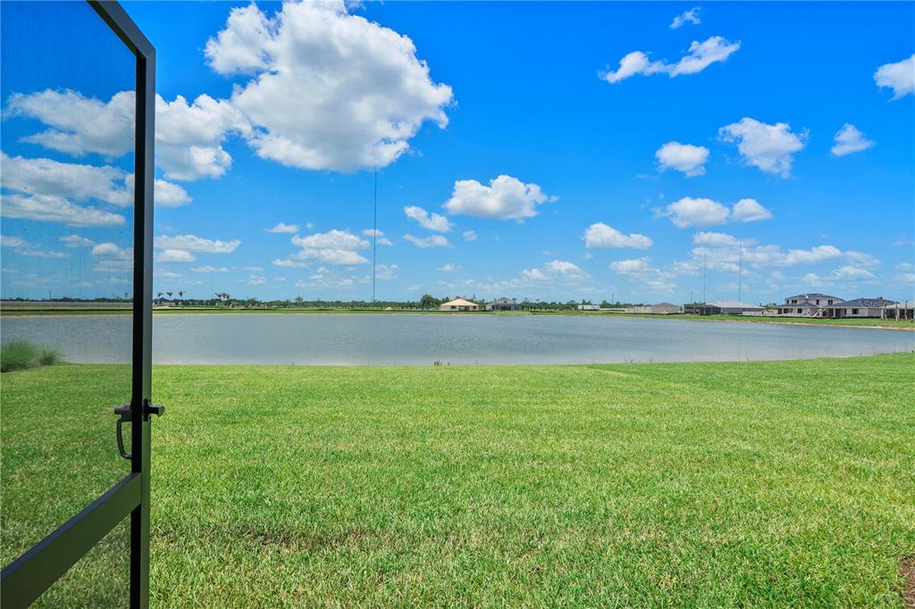 16056 Shoreline Drive Punta Gorda, FL 33982 - Photo 34 of 57 a view of a lake and sunset