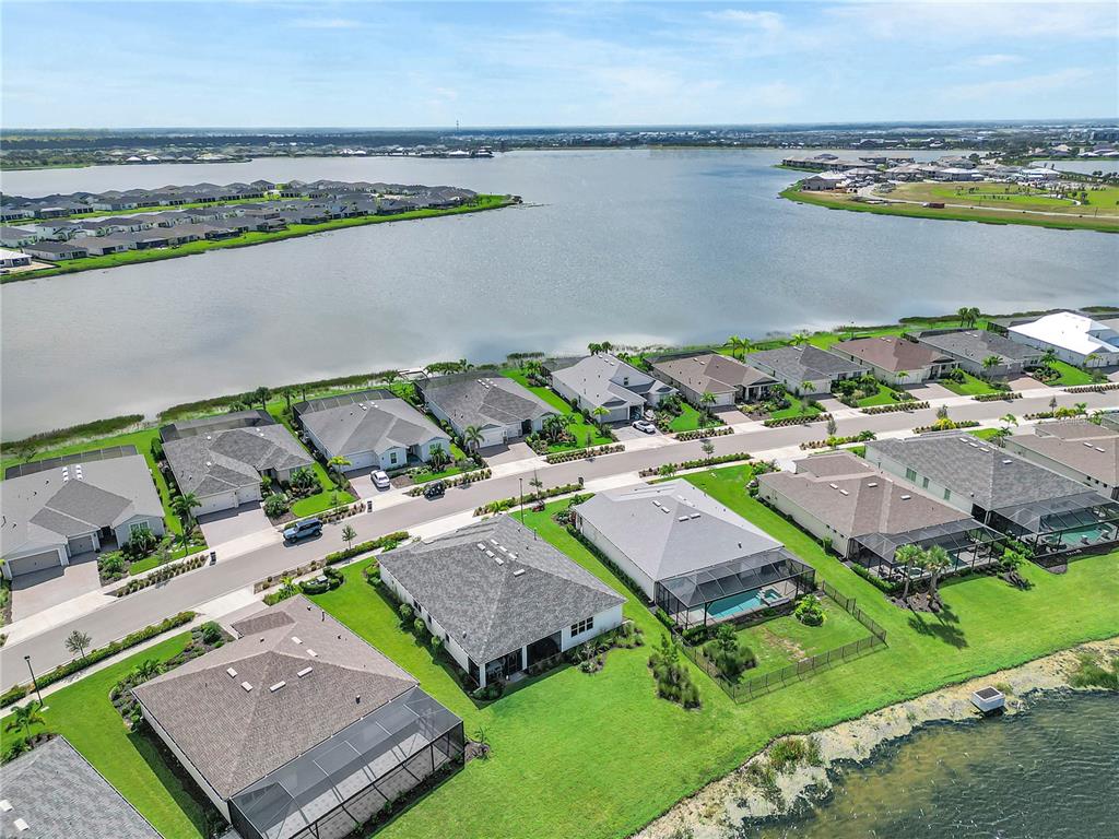 16056 Shoreline Drive Punta Gorda, FL 33982 - Photo 41 of 57 an aerial view of houses with yard
