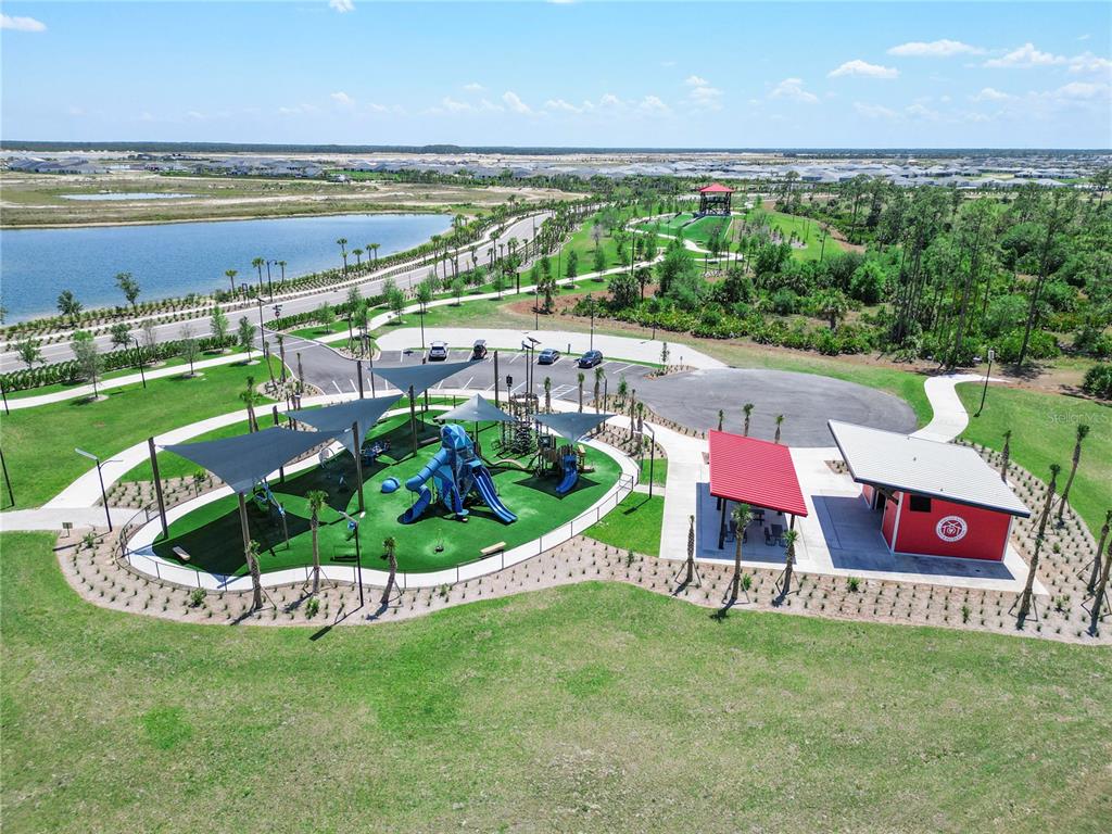 16056 Shoreline Drive Punta Gorda, FL 33982 - Photo 49 of 57 a table and chairs with an outdoor space