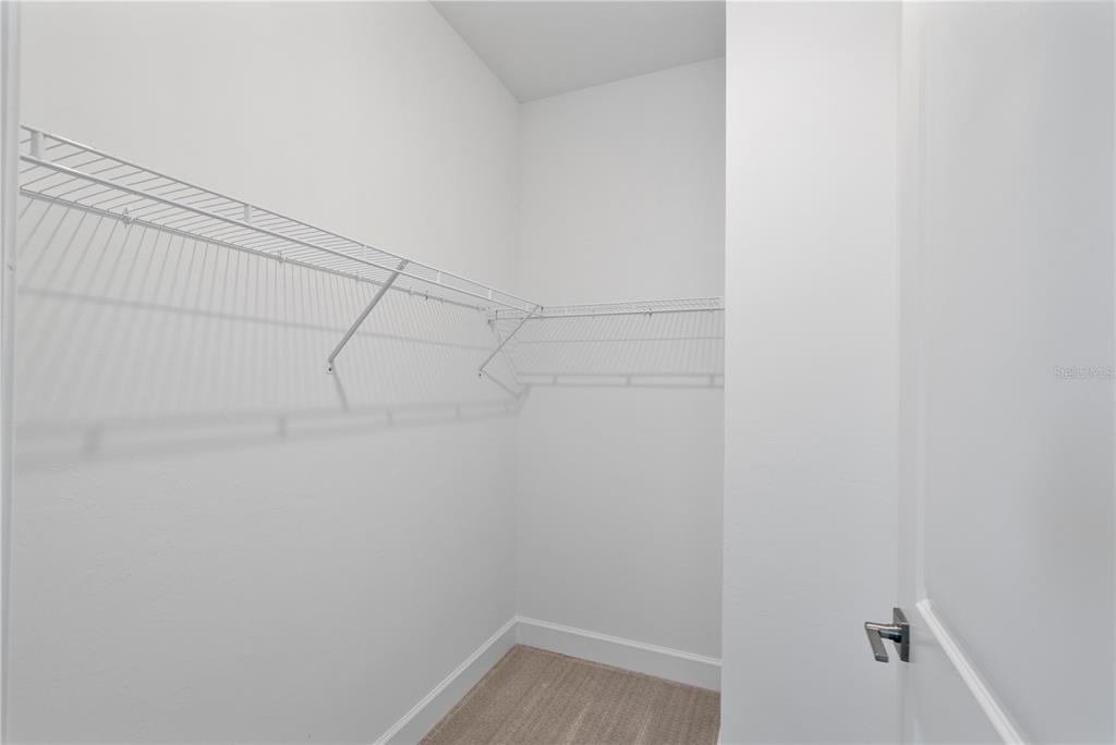 16056 Shoreline Drive Punta Gorda, FL 33982 - Photo 7 of 57 a view of a room with racks on the wall