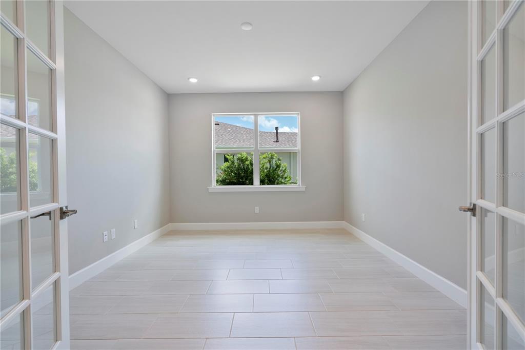 16056 Shoreline Drive Punta Gorda, FL 33982 - Photo 9 of 57 a view of an empty room with a window