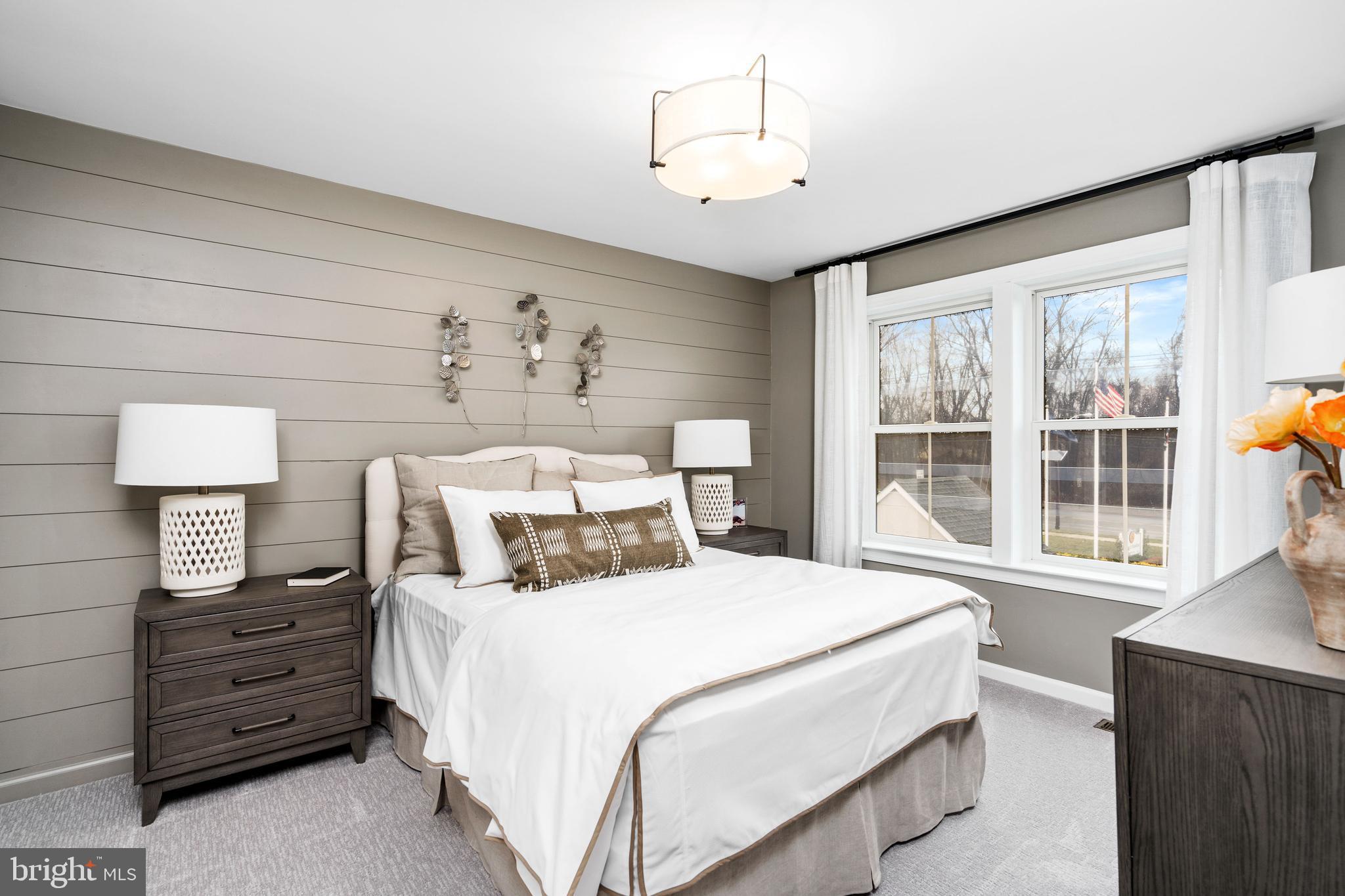 44 Kay Chiarello Way Hamilton, NJ 08690 - Photo 11 of 19 a bedroom with a large bed and a window