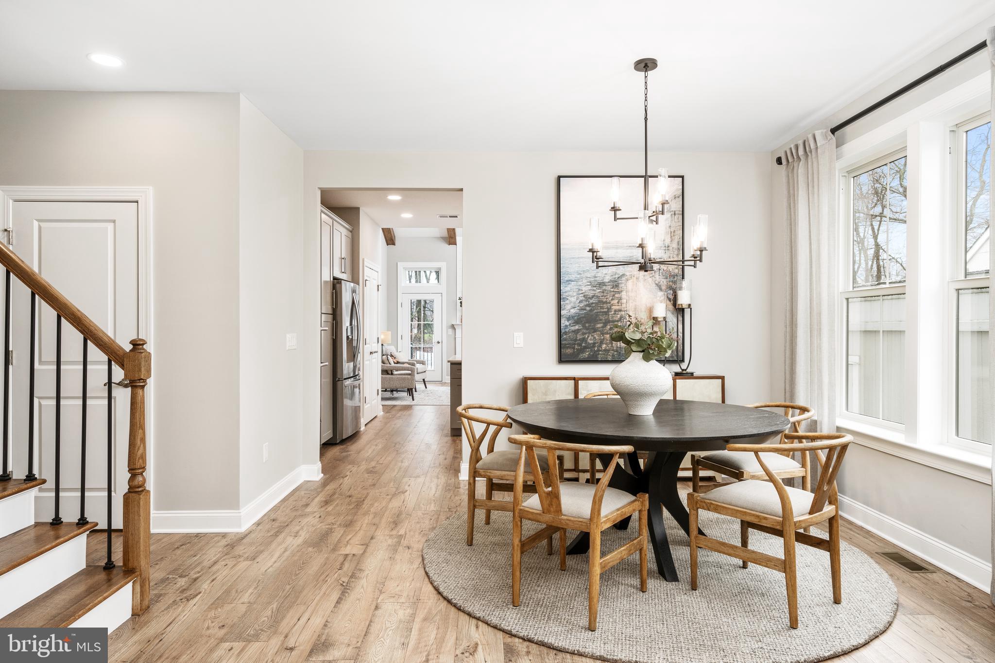 44 Kay Chiarello Way Hamilton, NJ 08690 - Photo 6 of 19 a dining room with furniture a chandelier and wooden floor