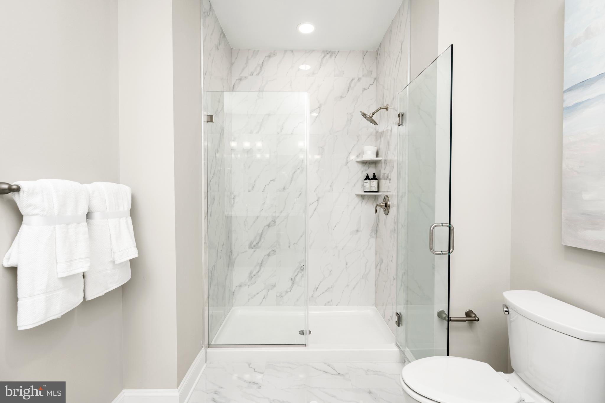 44 Kay Chiarello Way Hamilton, NJ 08690 - Photo 9 of 19 a bathroom with a toilet and shower