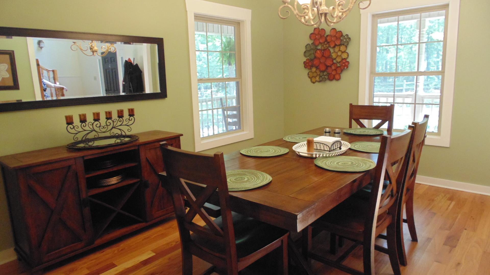 821 Deepwoods Road Sewanee, TN 37375 - Photo 6 of 30 a view of a dining room with furniture window and wooden floor