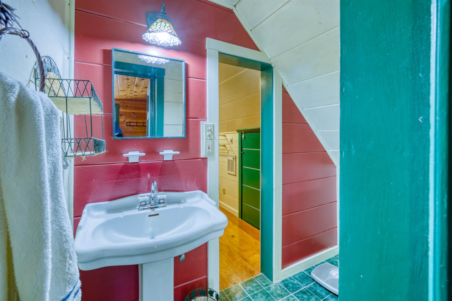 42025 Tollhouse Road Shaver Lake, CA 93664 - Photo 50 of 64 a bathroom with a sink and a mirror