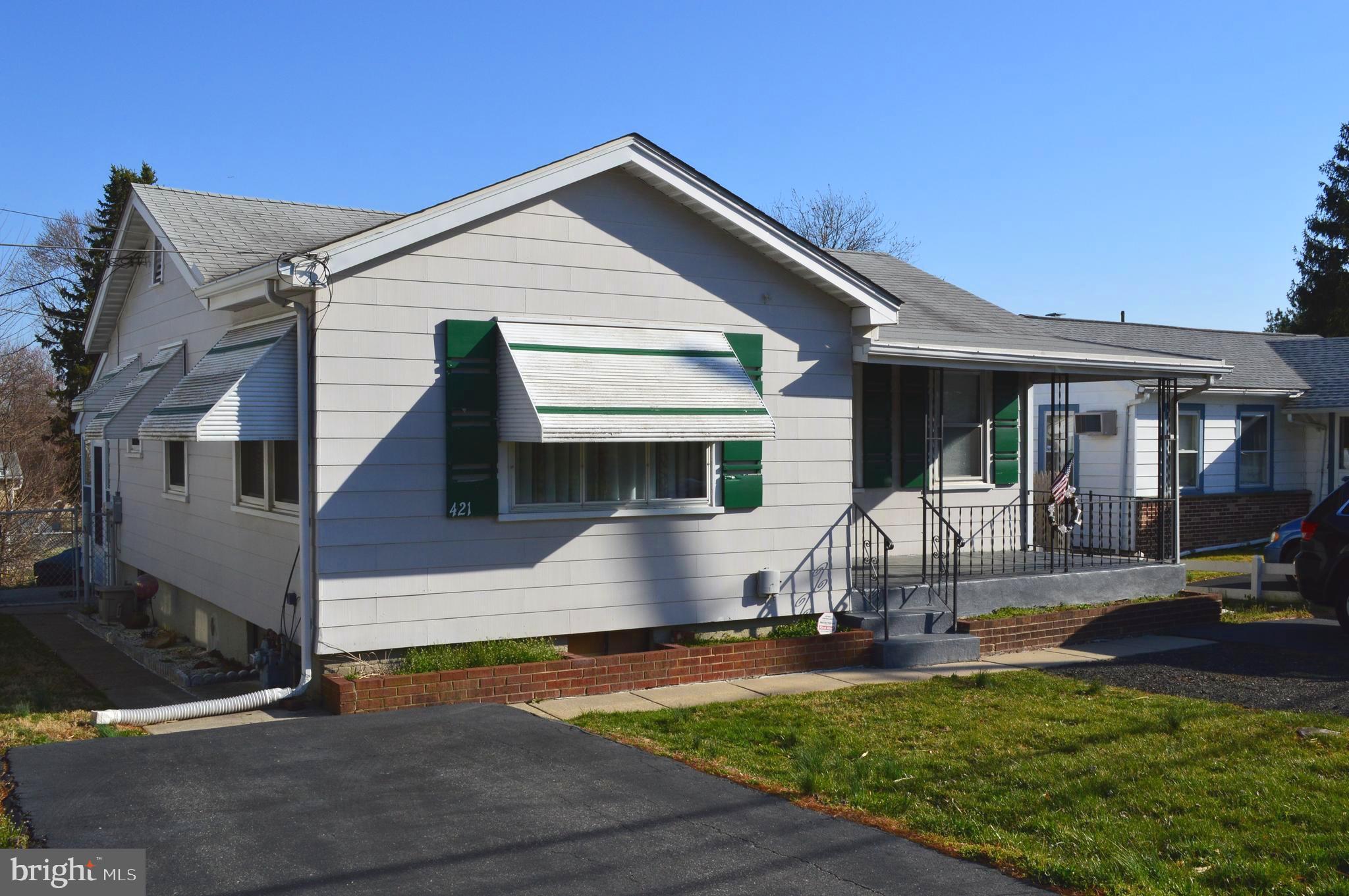 421 Dutton Mill Road, Unit 421 Brookhaven, PA 19015 - Photo 1 of 18 Covered front porch with entry door