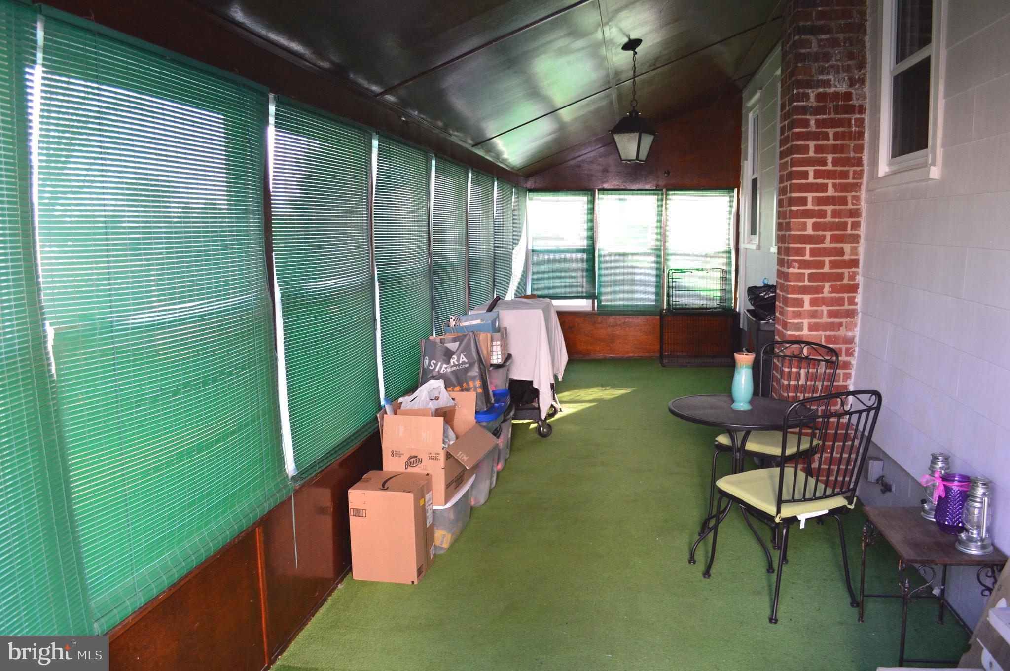 421 Dutton Mill Road, Unit 421 Brookhaven, PA 19015 - Photo 9 of 18 Large rear screened porch