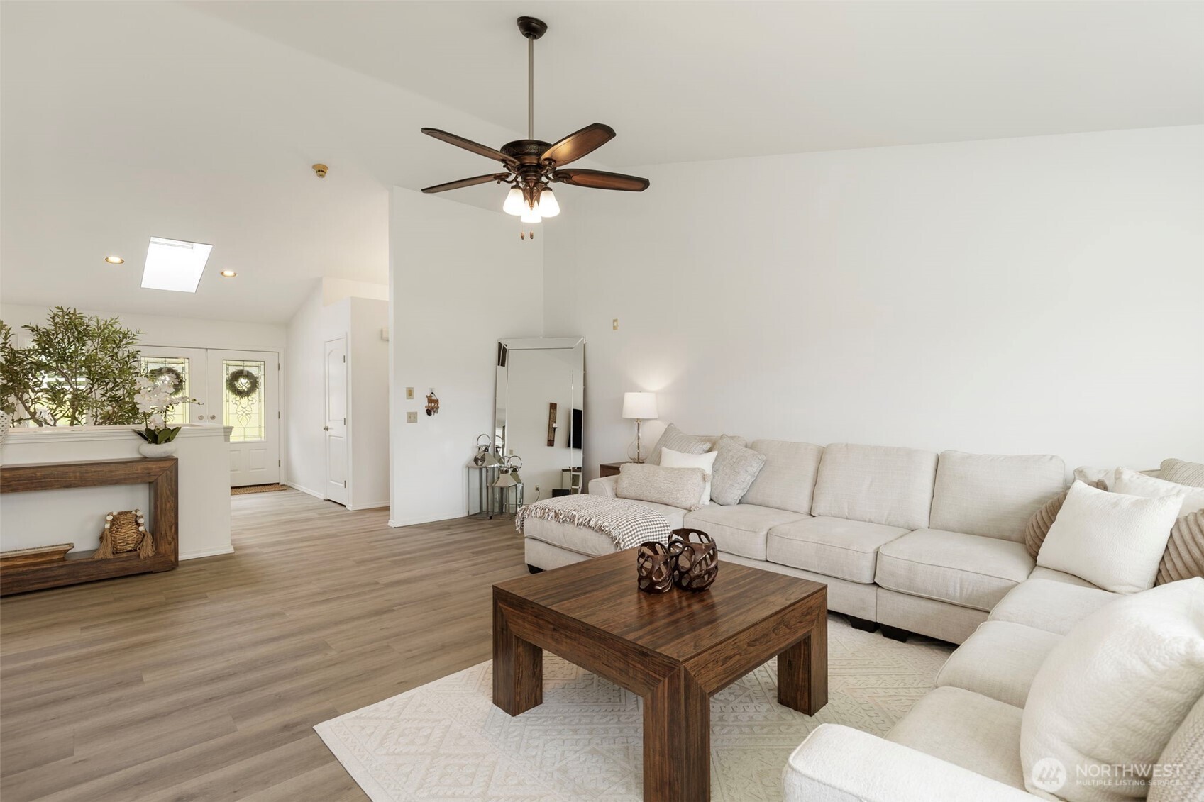 14110 Glenwood Road Southwest Port Orchard, WA 98367 - Photo 6 of 40 a living room with furniture and a wooden floor