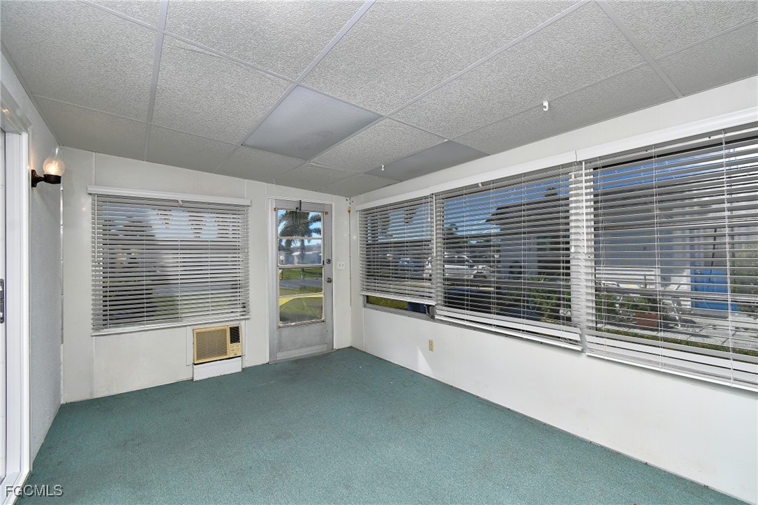 13 Hamlin Court Lehigh Acres, FL 33936 - Photo 13 of 31 a view of a room with a large window