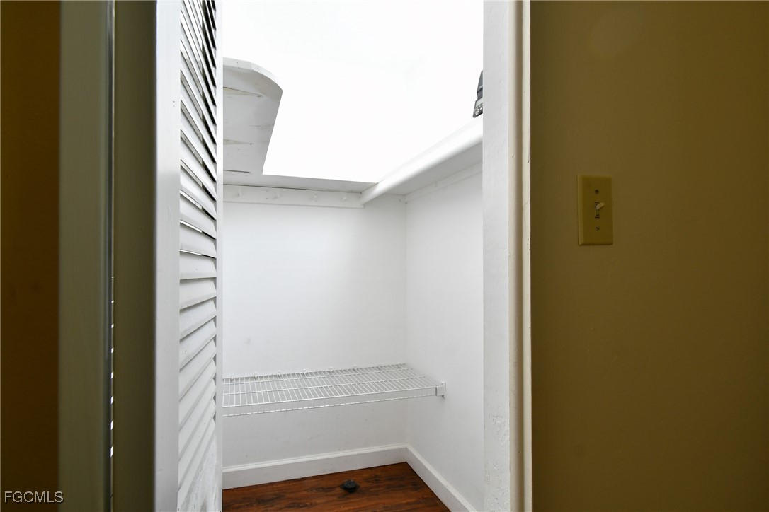 13 Hamlin Court Lehigh Acres, FL 33936 - Photo 22 of 31 a view of walk in closet