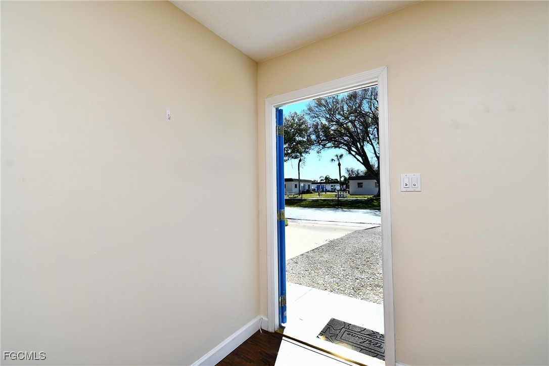 13 Hamlin Court Lehigh Acres, FL 33936 - Photo 6 of 31 a view of car door