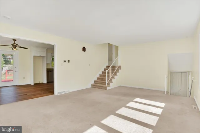 an empty room with windows