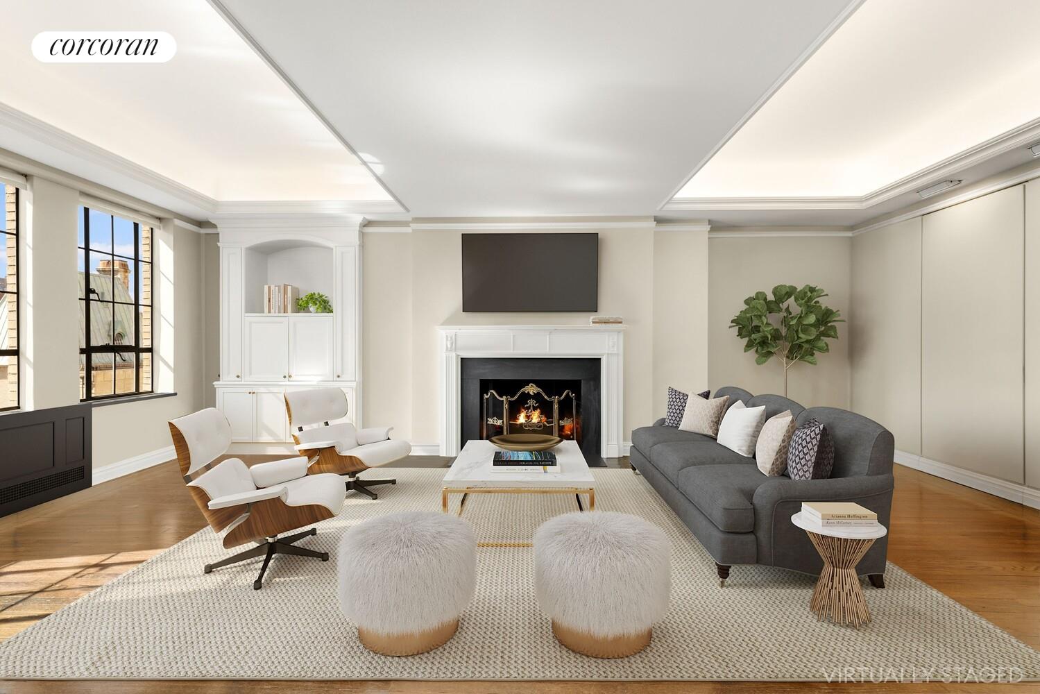 a living room with furniture fireplace and window