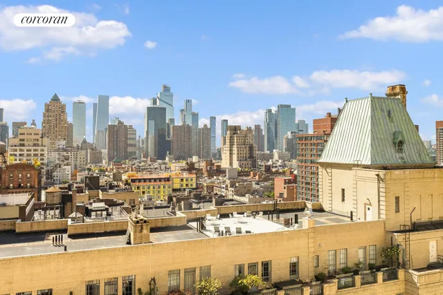 a living room with fireplace furniture and a wooden floor