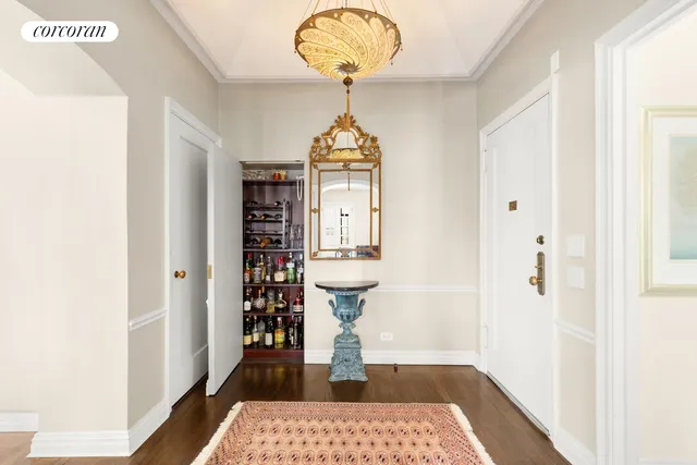 a view of a a dining room with furniture and wooden floor