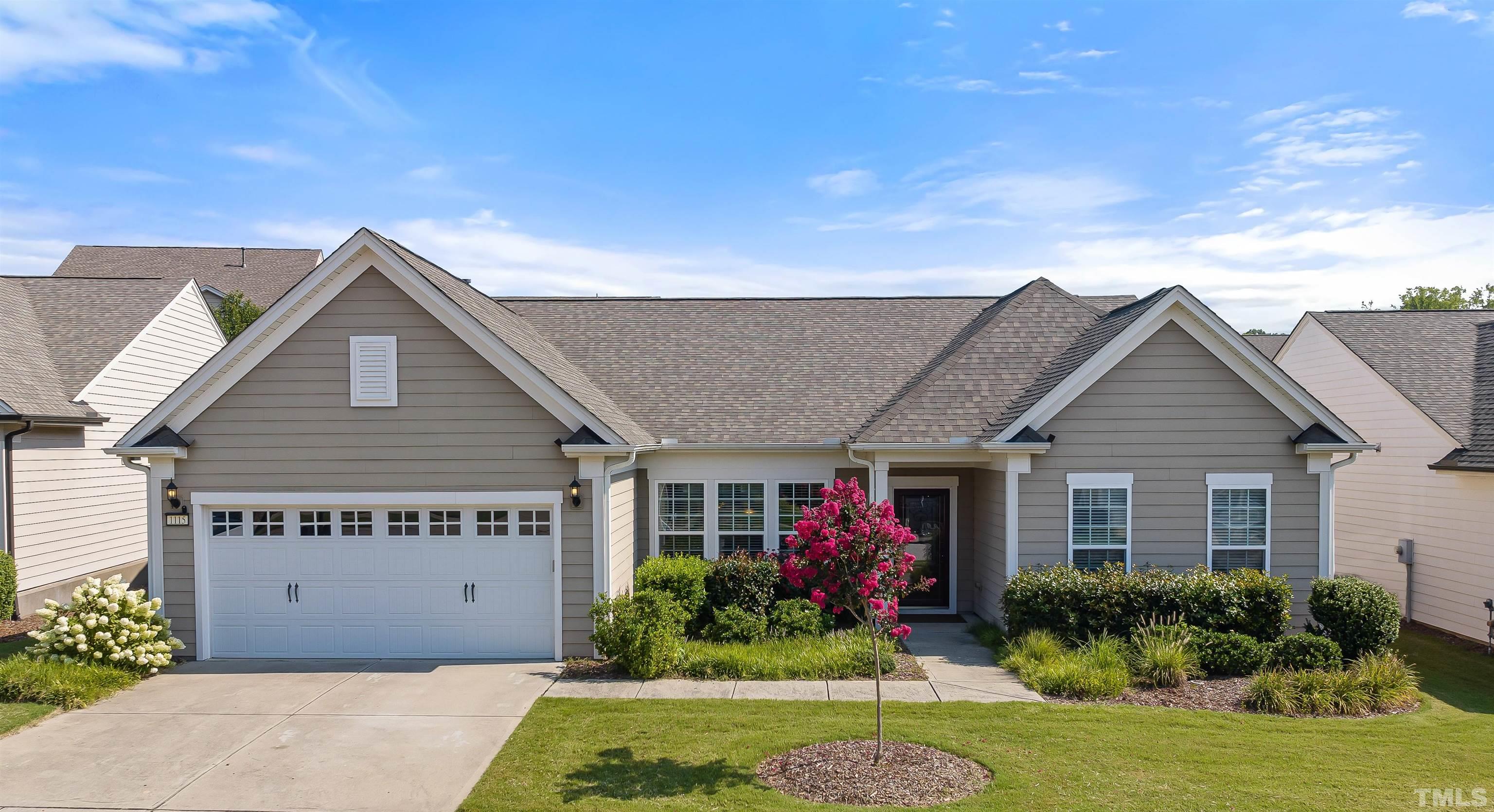 1115 Hooper Place Durham, NC 27703 - Photo 1 of 40 a front view of a house with garden
