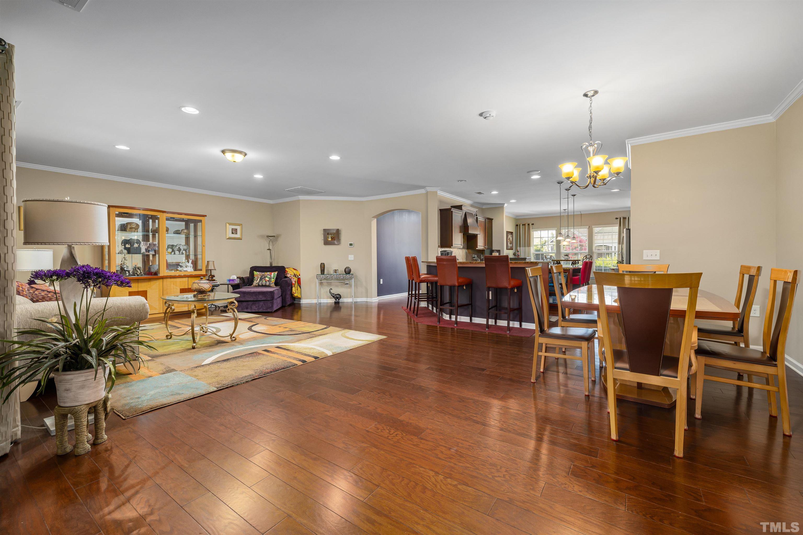 1115 Hooper Place Durham, NC 27703 - Photo 11 of 40 a view of a dining room with furniture window and wooden floor
