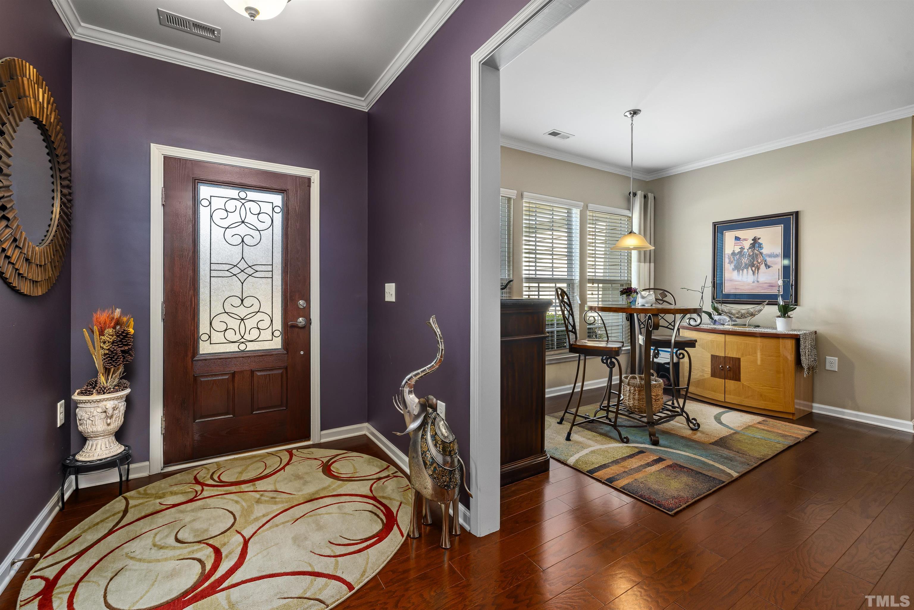 1115 Hooper Place Durham, NC 27703 - Photo 3 of 40 a view of a livingroom with furniture window and wooden floor