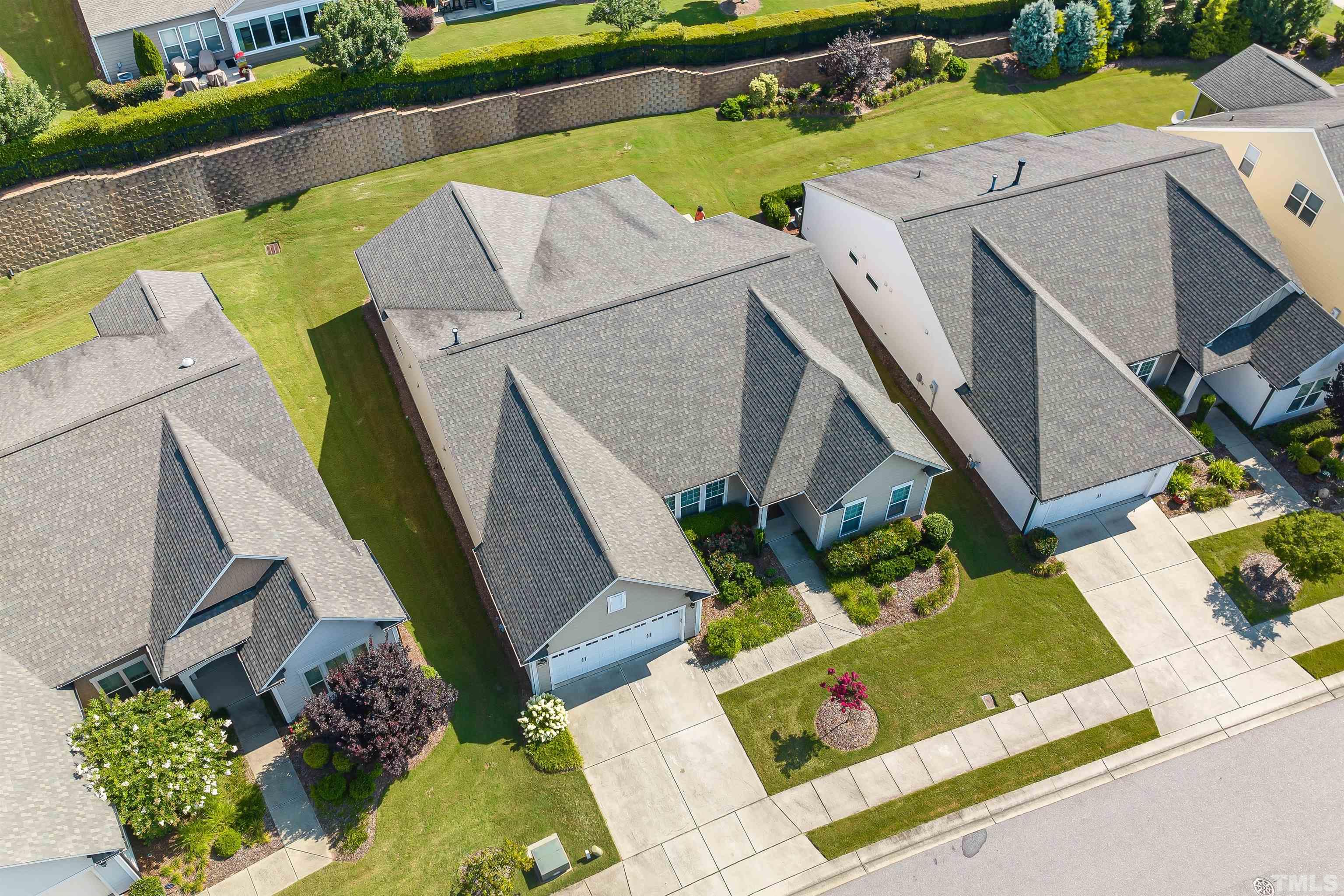 1115 Hooper Place Durham, NC 27703 - Photo 37 of 40 an aerial view of a house with a garden and plants