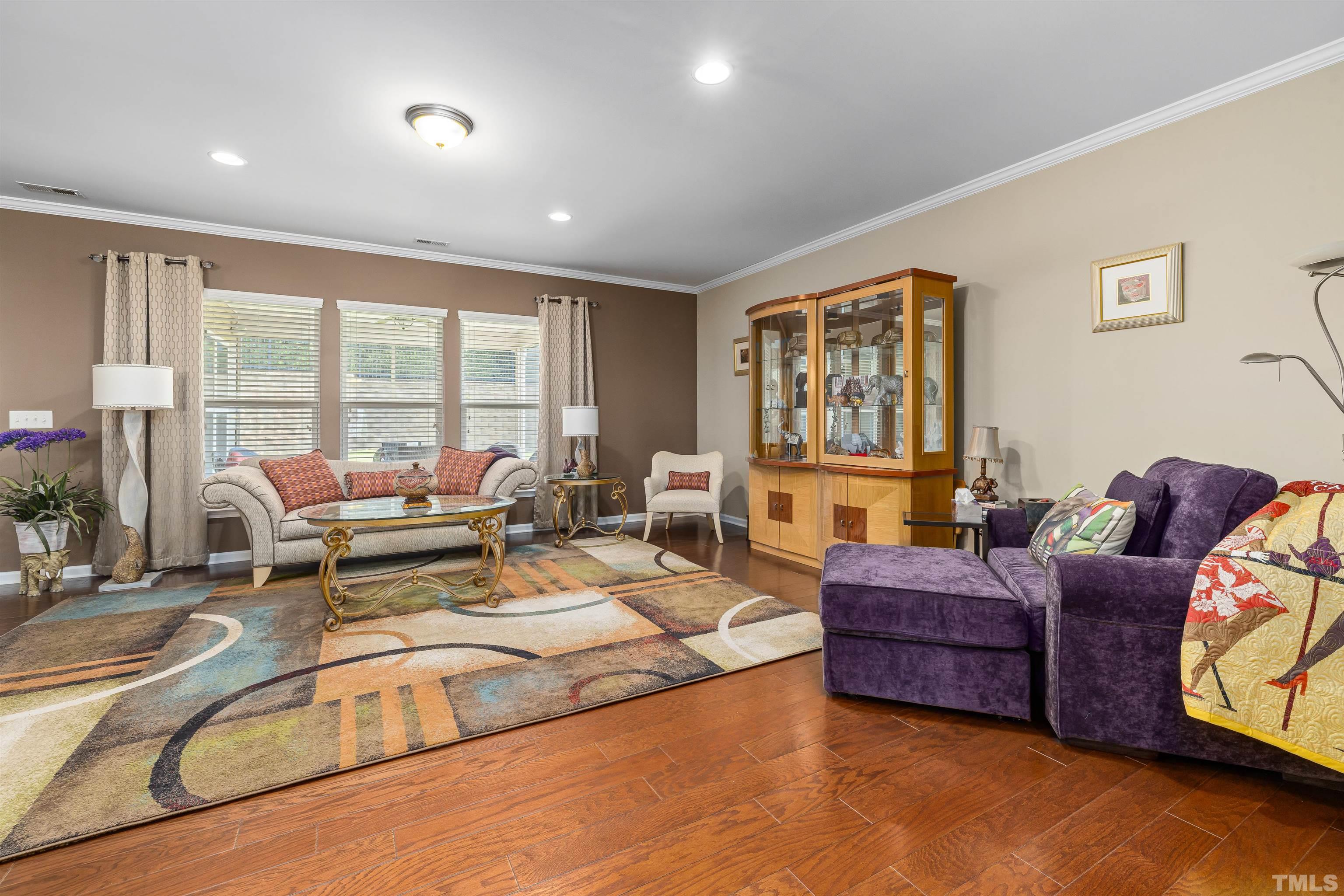 1115 Hooper Place Durham, NC 27703 - Photo 9 of 40 a living room with furniture and large windows
