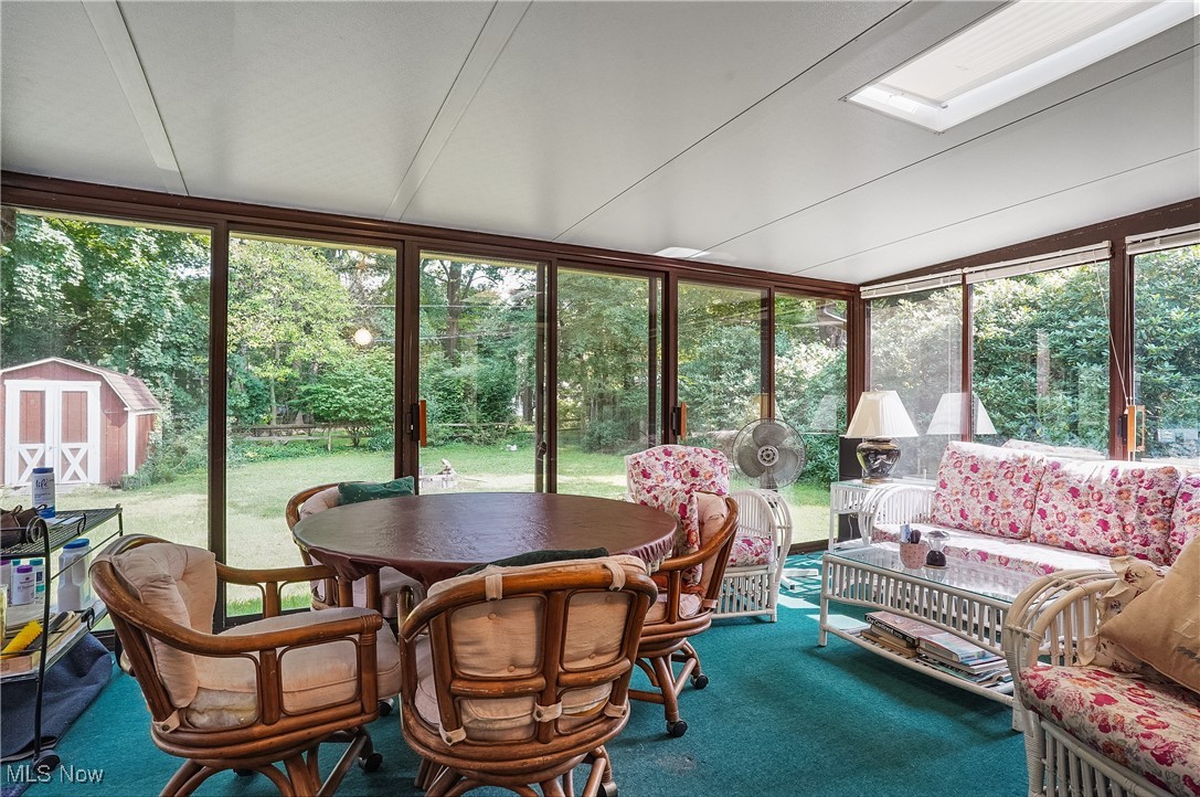2829 Lee Road Silver Lake, OH 44224 - Photo 21 of 30 Sunroom featuring a skylight
