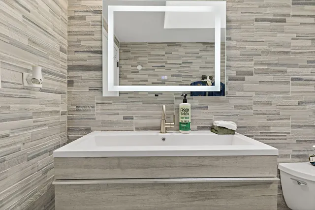 a bathroom with a sink and a toilet