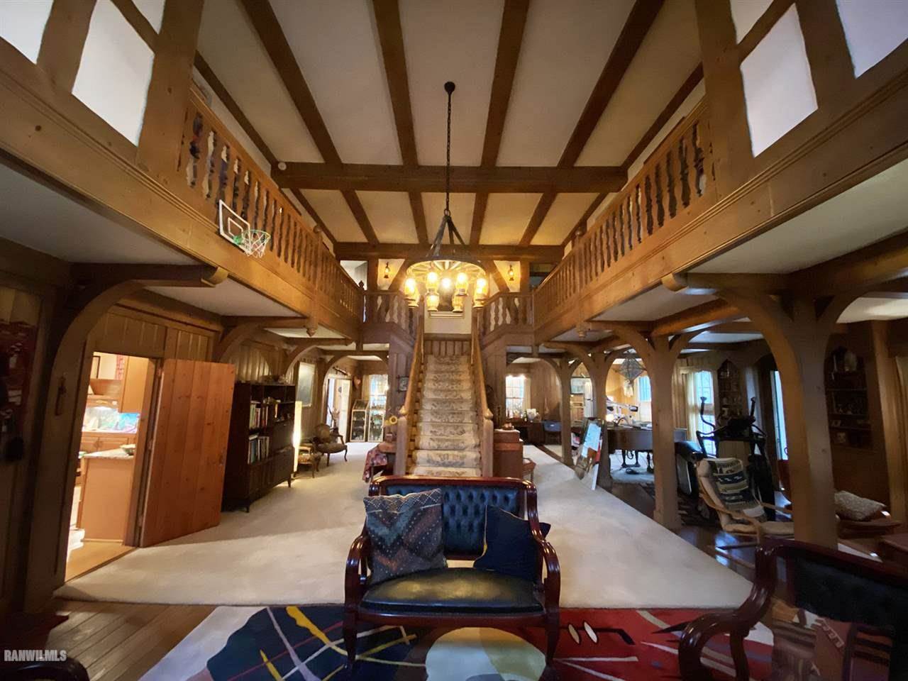 2871 West Forest Road Freeport, IL 61032 - Photo 23 of 68 a view of a dining room with furniture and a chandelier