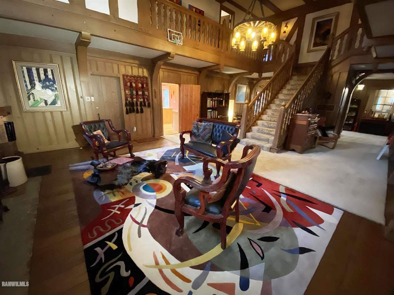 2871 West Forest Road Freeport, IL 61032 - Photo 24 of 68 a view of a dining room with furniture and chandelier