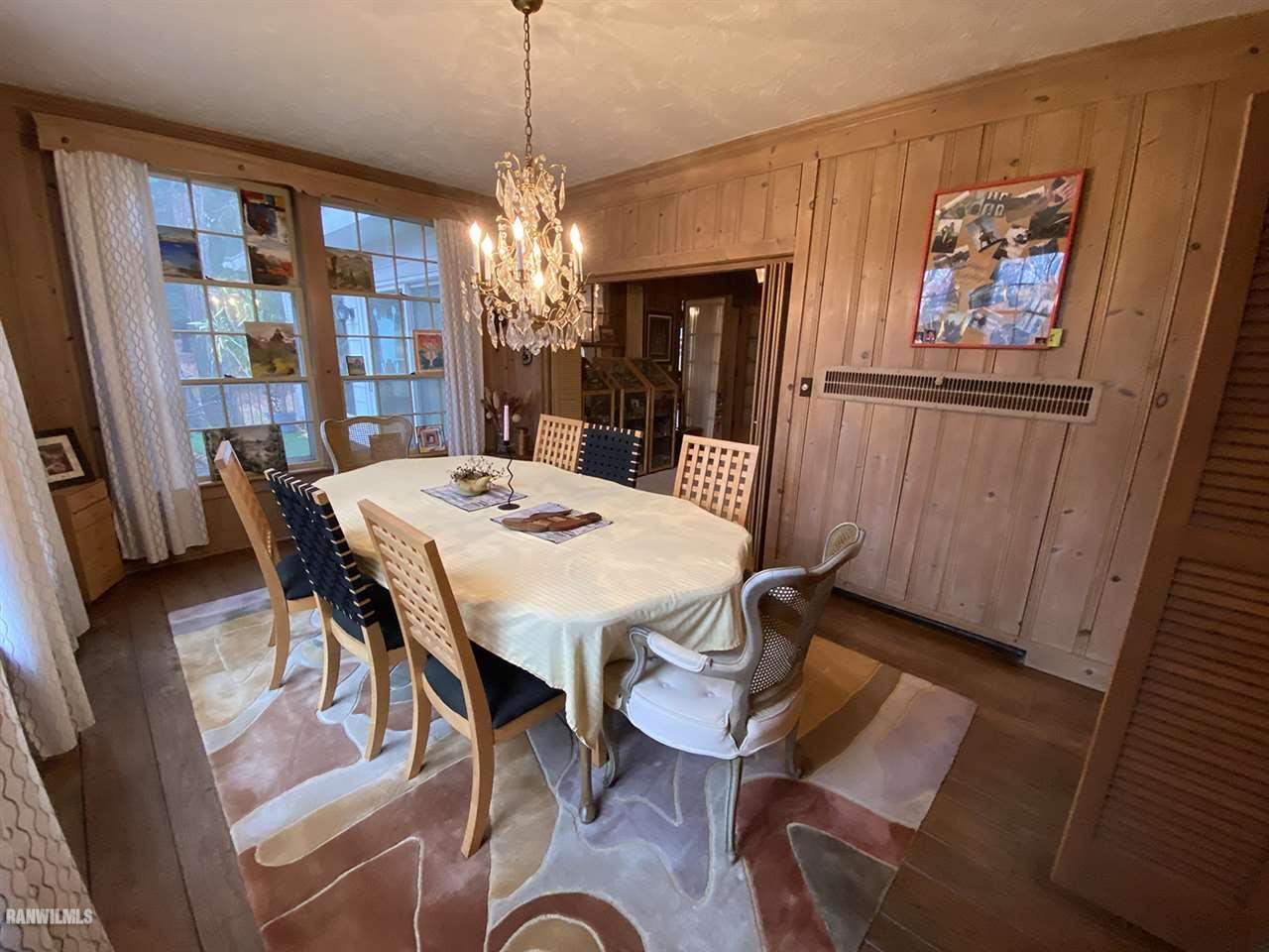 2871 West Forest Road Freeport, IL 61032 - Photo 30 of 68 a view of a dining room with furniture window and wooden floor